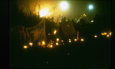 Sigrid M&oslash;ller: Greenham Common Pictures. Base, Main Gate at night.