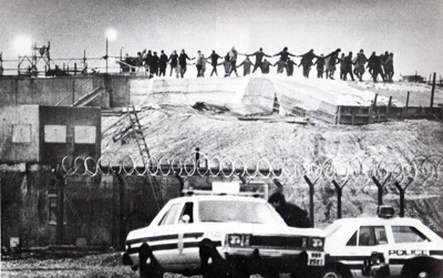 Greenham Common women dancing on silos January 1, 1983.